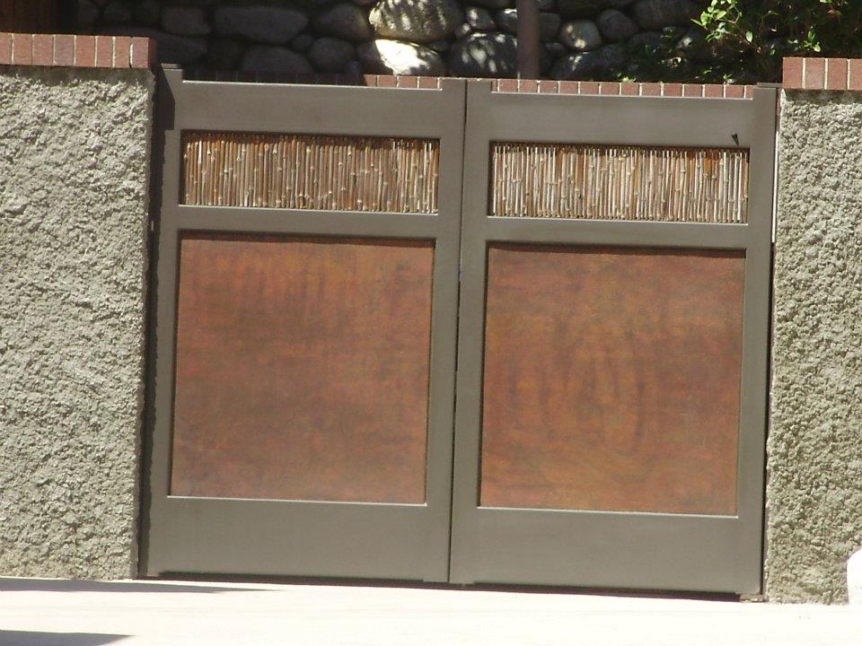 Steel-framed double gate with copper panels and bamboo — Arizona