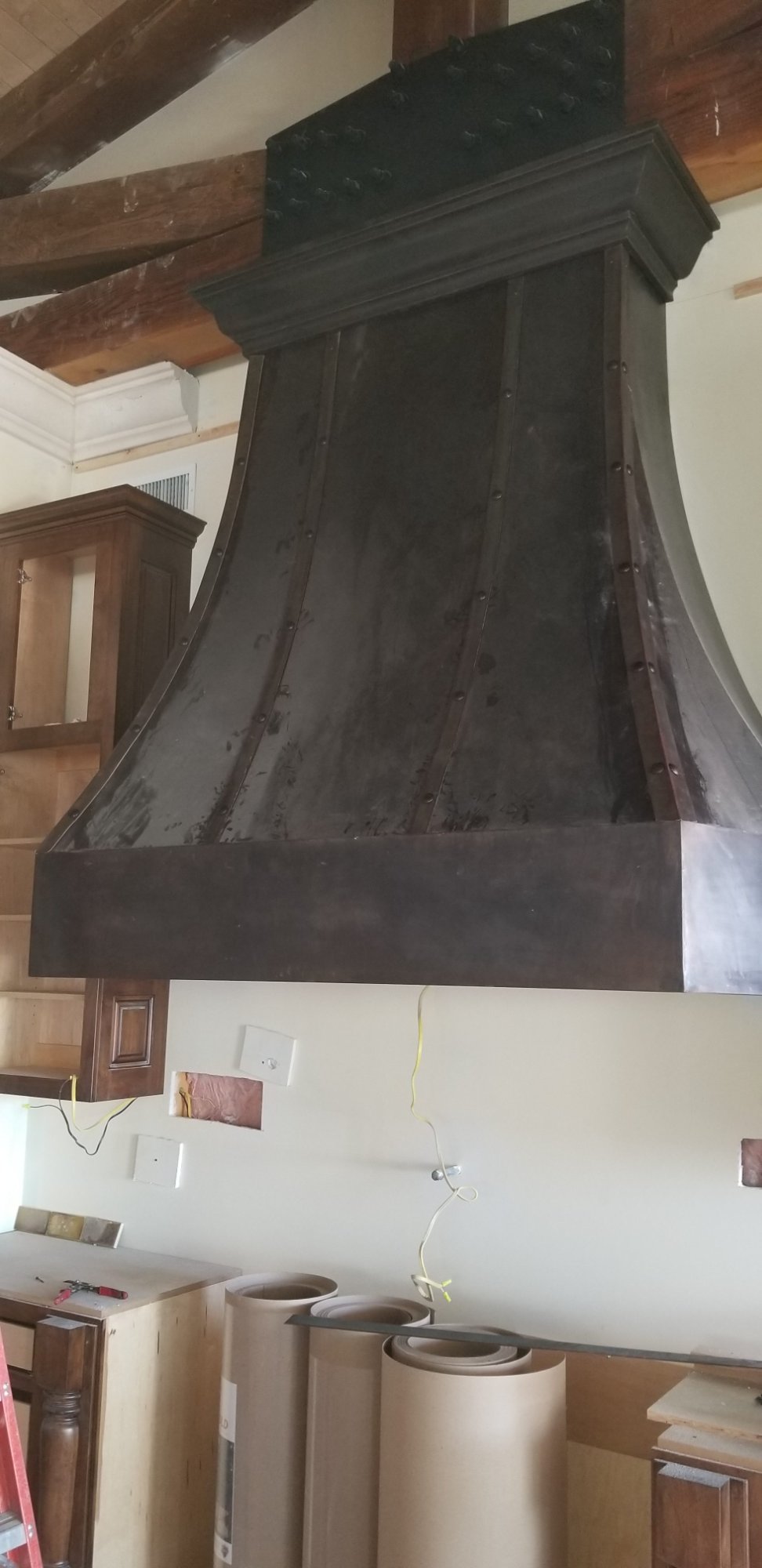 Dark patina copper range hood with hand-hammered finish — Arizona