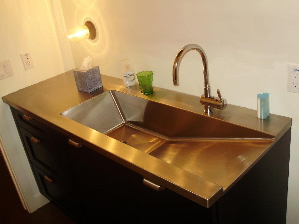 Custom stainless steel undermount sink and brushed countertop — Phoenix AZ